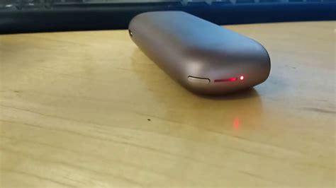 iqos red light blinking while charging